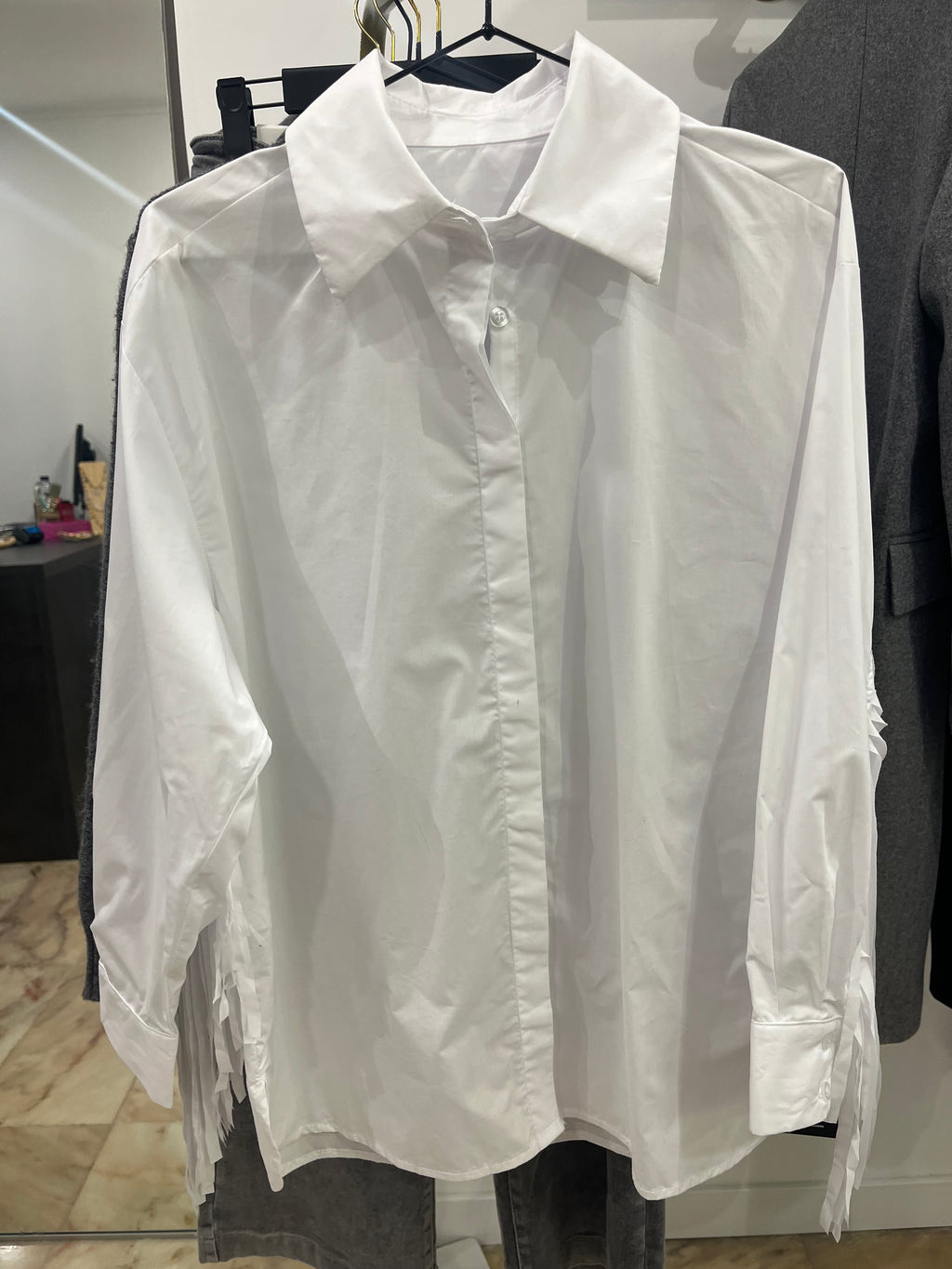 Camisa flecos