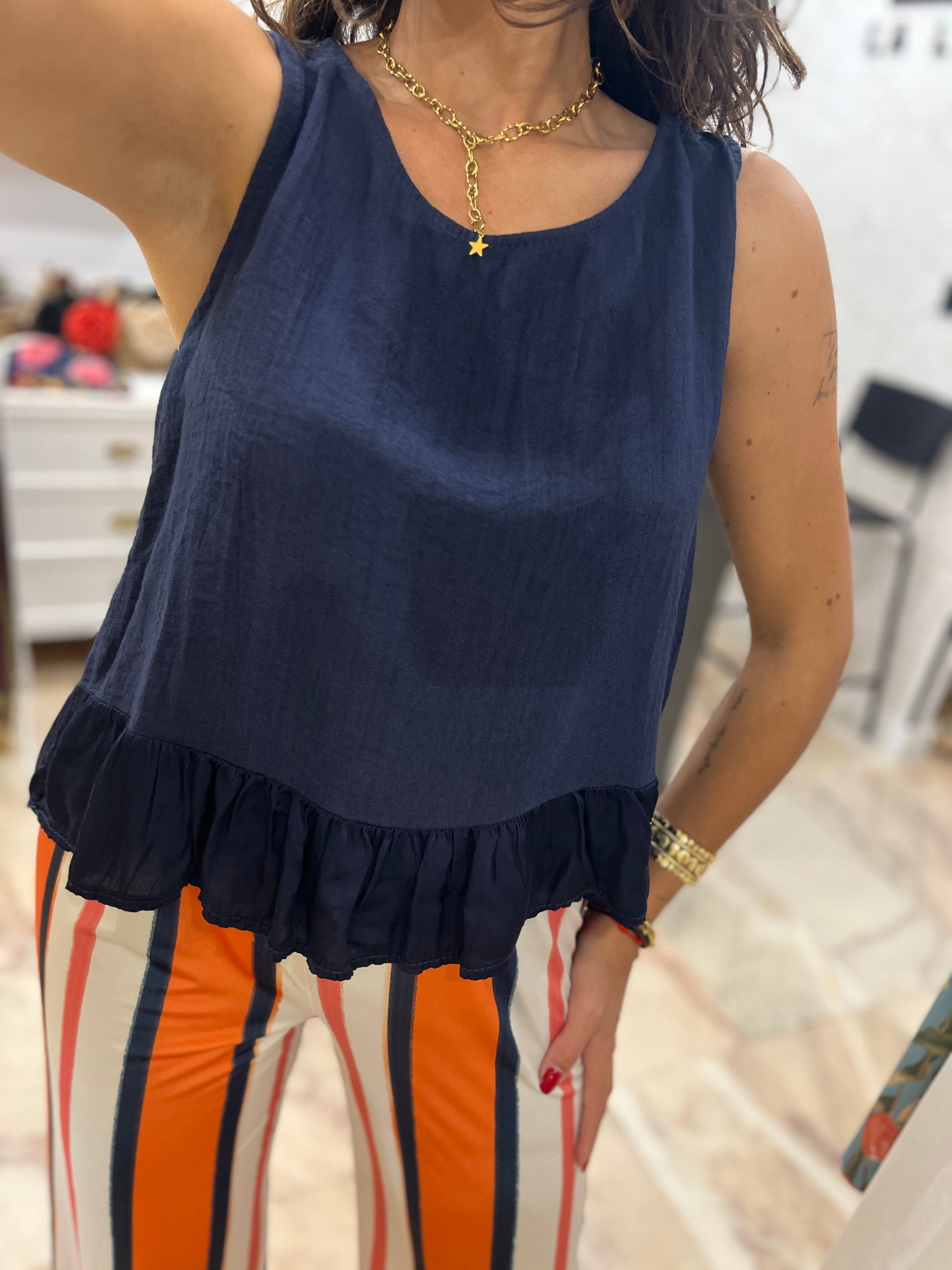 BLUSA VOLANTE