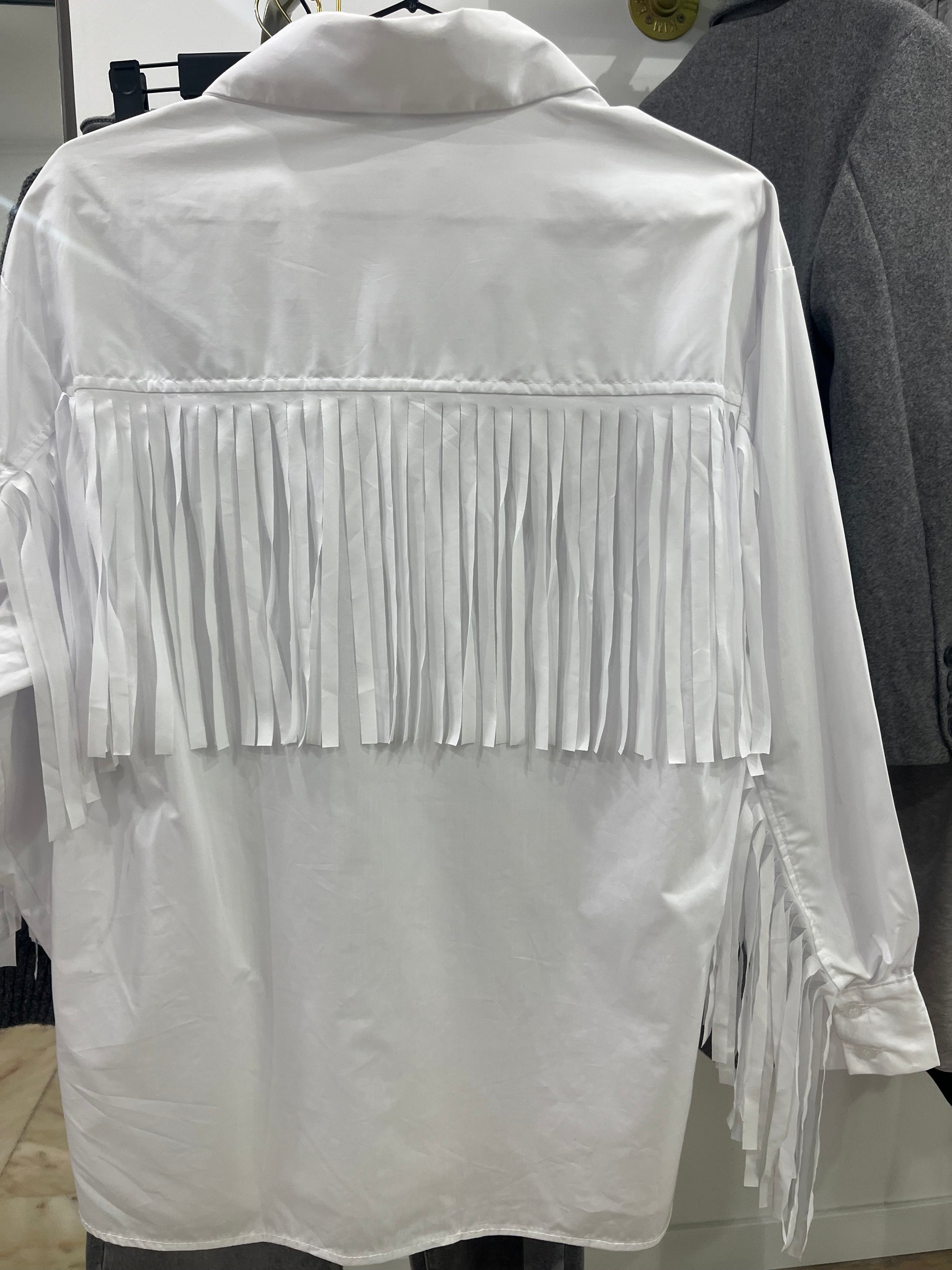 Camisa flecos