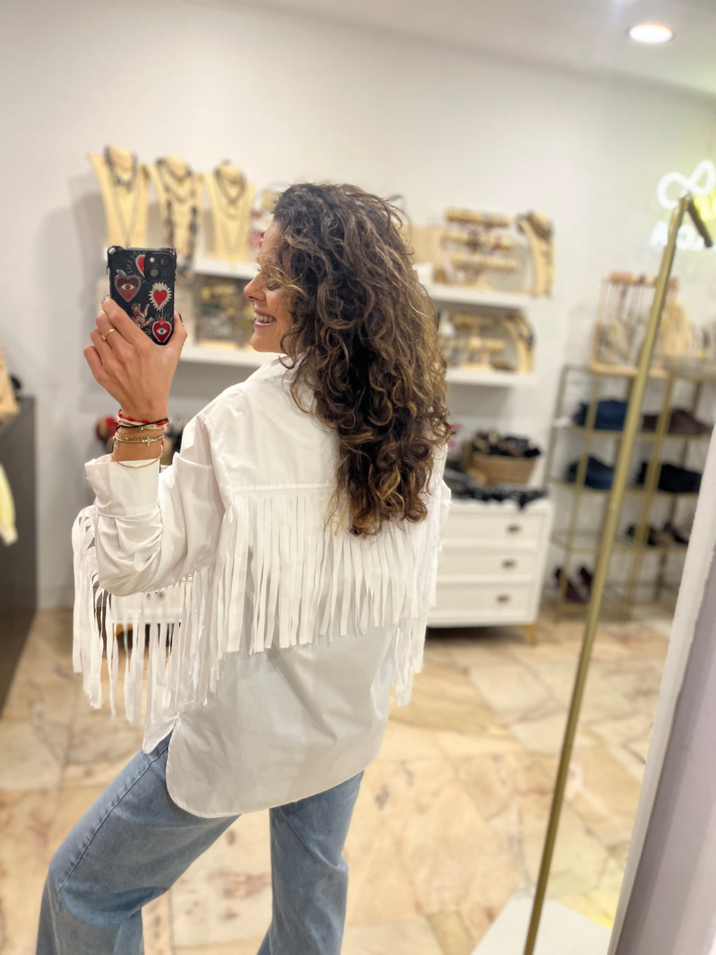 Camisa flecos